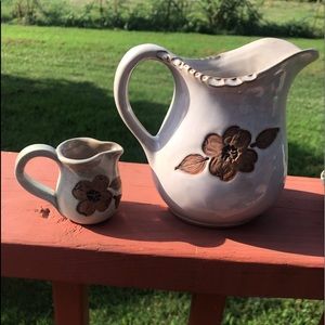 Stoneware pottery pitcher and tooth pick holder.